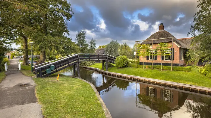 Giethoorn village with a house and a river